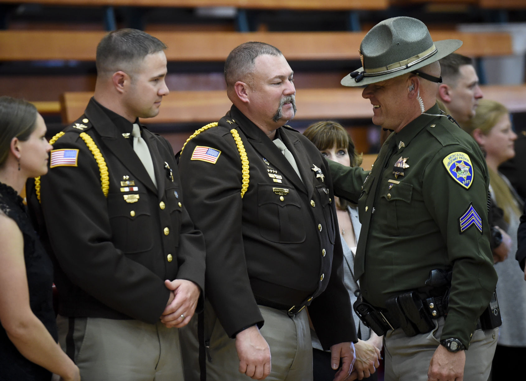 Montana Highway Patrol Trooper Jay Nelson, right, chats with Broadwater County Sheriff Wynn Meehan